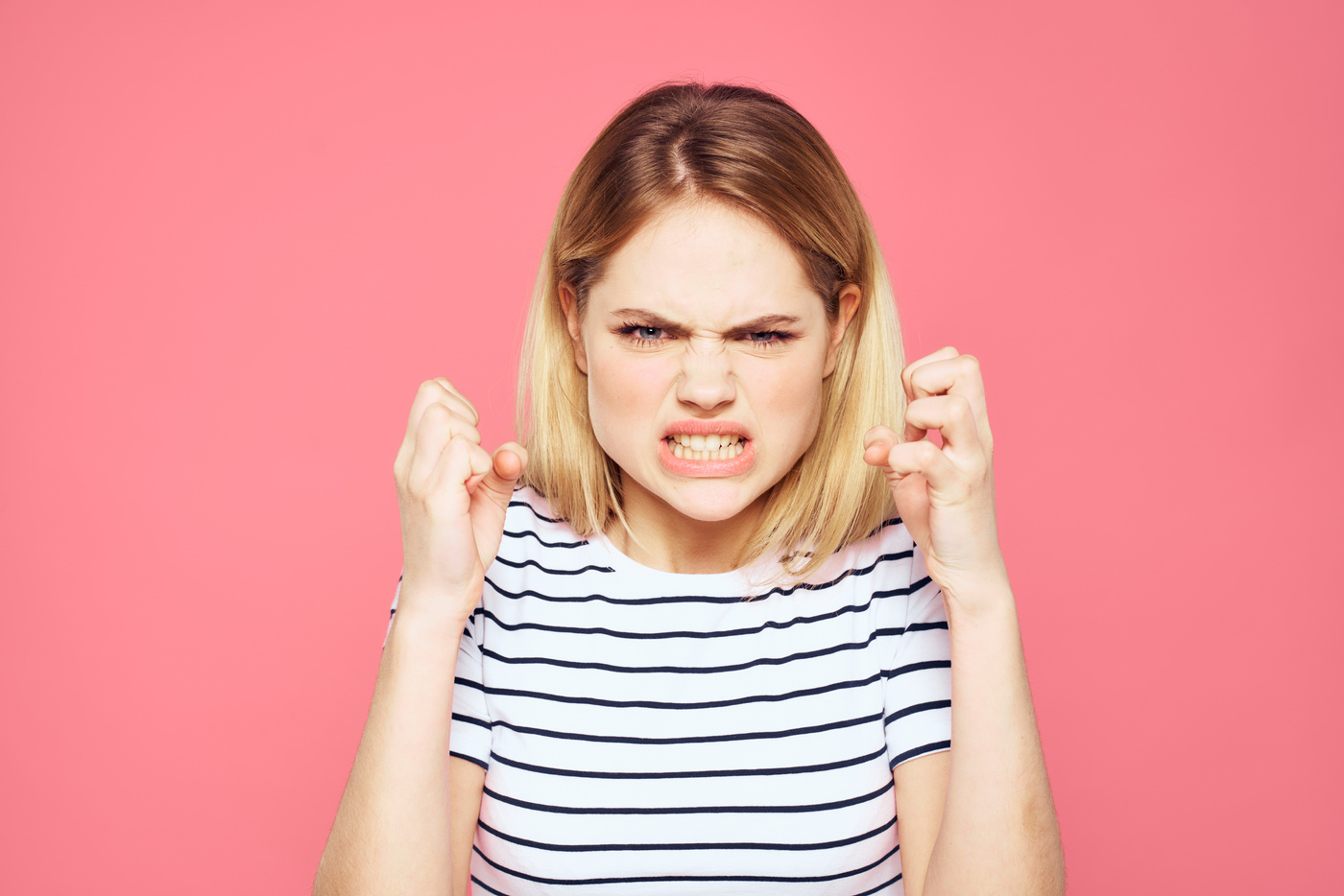 Blonde Striped T-Shirt Emotion Gesture Hands Displeased Facial Expression Pink Background